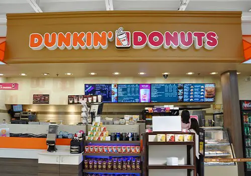 The inside of a modern Dunkin' Donuts shop.
