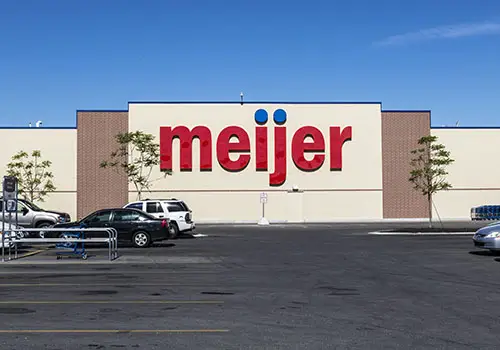 Meijer retail location storefront, sign, and parking lot.