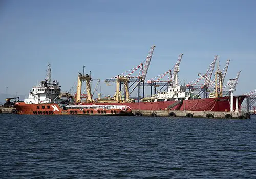 A large cargo ship in port.